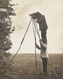 Richard and Cherry Kearton taking a photograph of a bird's nest